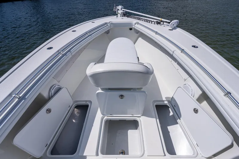 Slide: The Image of 2015 Yellowfin 32 boat with open storage compartments and seating. - 11