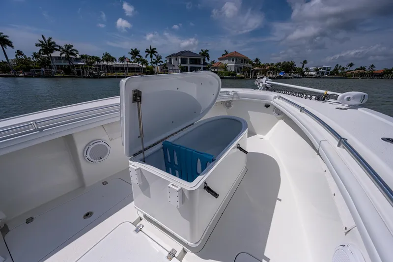 Slide: The Image of 2015 Yellowfin 32 boat with open storage compartment on deck. - 13