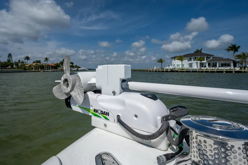 Slide: The Image of Close-up of a 2015 Yellowfin 32 boat's trolling motor on a sunny day. - 14