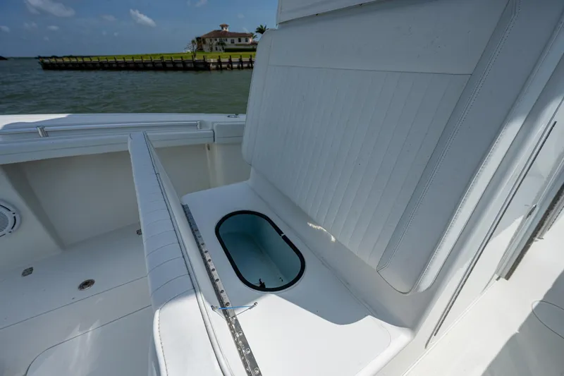 Slide: The Image of 2015 Yellowfin 32 boat interior with open storage compartment. - 19