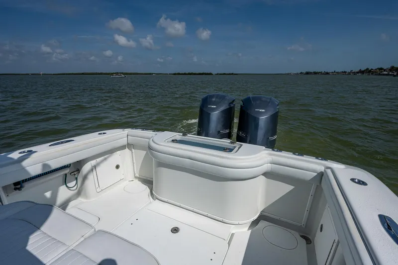 Slide: The Image of 2015 Yellowfin 32 boat with twin outboard motors on open water. - 20