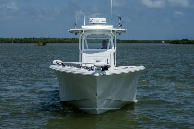 Slide: The Image of 2015 Yellowfin 32 boat on calm waters, front view. - 3