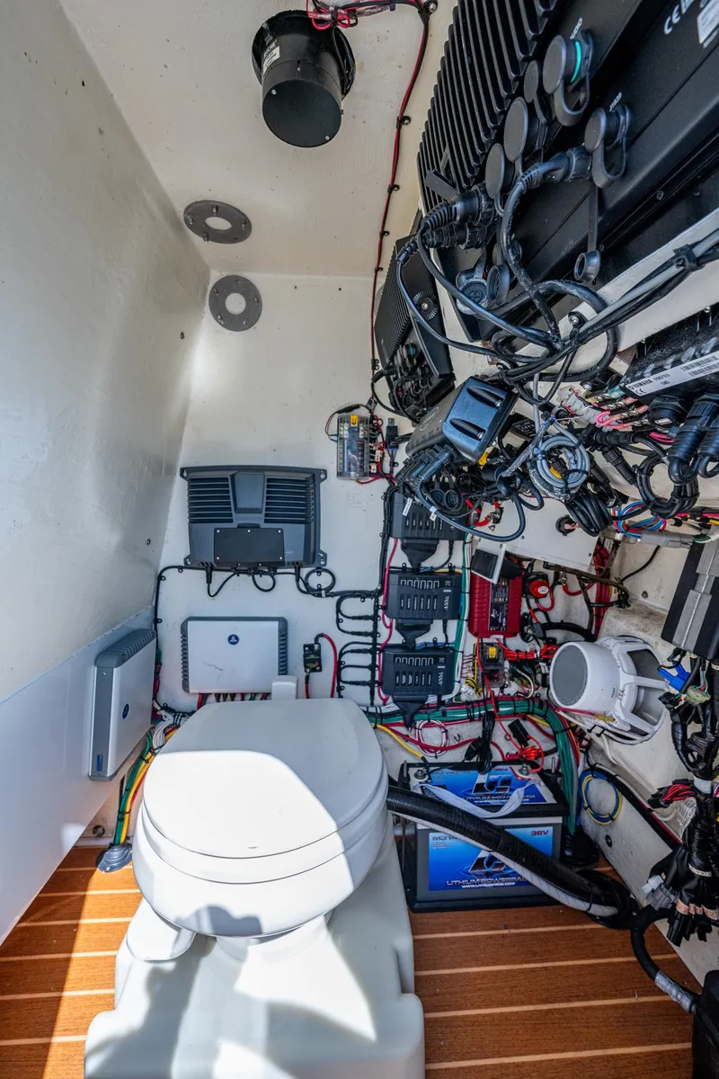 Slide: The Image of 2015 Yellowfin 32 boat interior with wiring and equipment. - 31