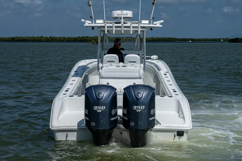 Slide: The Image of 2015 Yellowfin 32 boat with twin 350 HP engines on the water. - 5