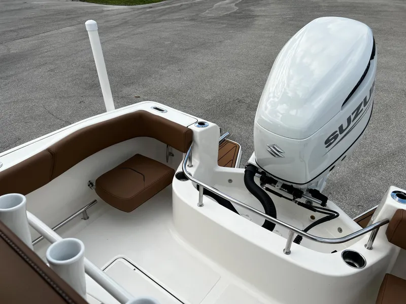 Slide: The Image of 2024 Pioneer 222 Sportfish boat with Suzuki outboard motor. - 34