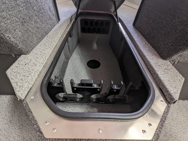 Slide: The Image of 2025 Lund 1875 Fisherman boat storage compartment with rod holders. - 8