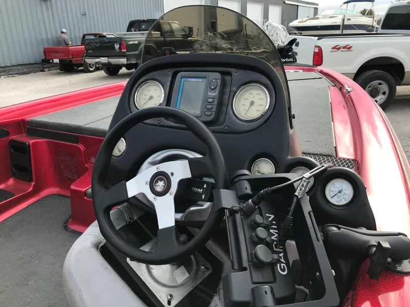 Slide: The Image of 2007 Stratos 285 XL boat dashboard with Garmin navigation system. - 13