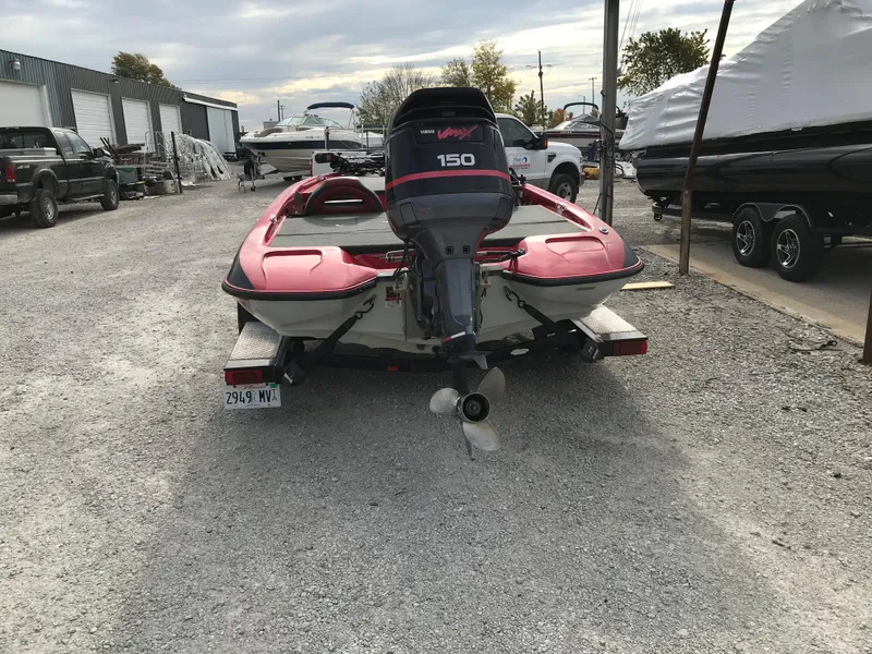 Slide: The Image of 2007 Stratos 285 XL boat with 150 HP motor in a boatyard. - 4