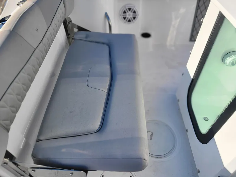 Slide: The Image of 2023 Wellcraft 242 Fisherman boat interior seating and storage area. - 14