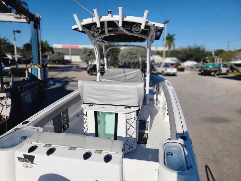 Slide: The Image of 2023 Wellcraft 242 Fisherman boat with T-top and covered console. - 6