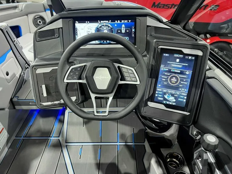 Slide: The Image of 2024 Supra SL dashboard with advanced digital displays and modern steering wheel design. - 12
