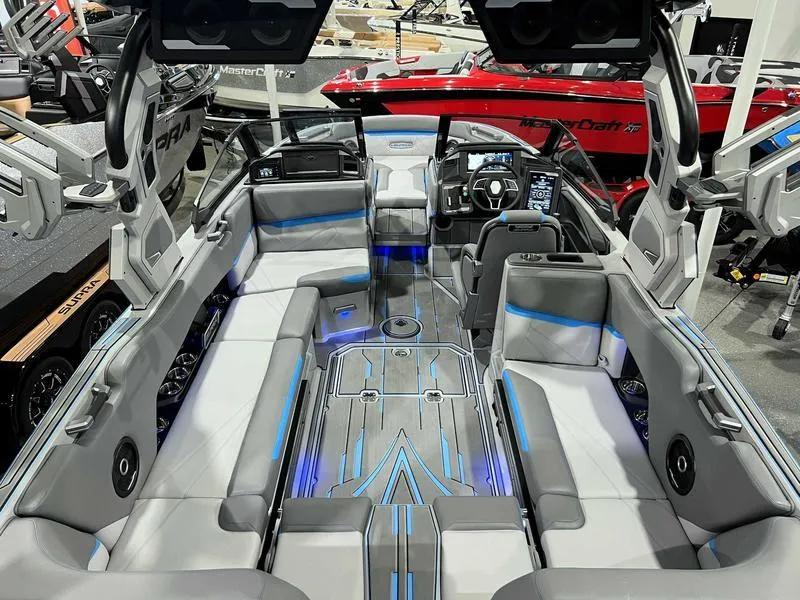 Slide: The Image of 2024 Supra SL boat interior with modern seating and advanced dashboard features. - 18