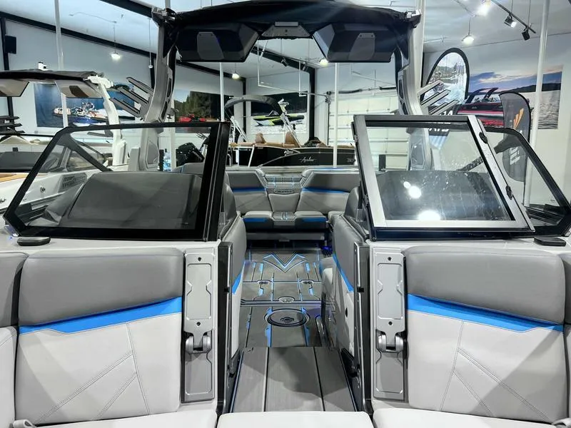 Slide: The Image of 2024 Supra SL boat interior with modern seating and sleek design. - 8