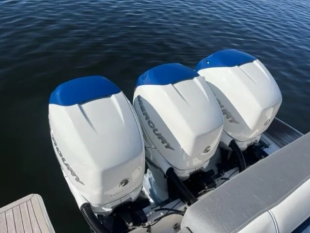 Slide: The Image of Triple Mercury outboard engines on a 2021 Tiara Yachts 38 LS. - 17
