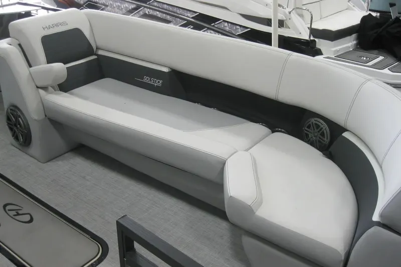 Slide: The Image of 2023 Harris FloteBote 250 Solstice interior with luxurious seating and modern design. - 11