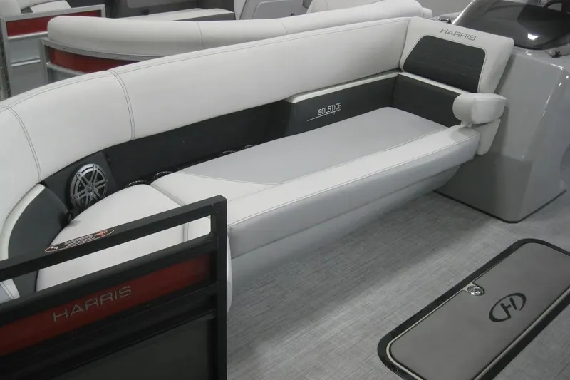 Slide: The Image of 2023 Harris FloteBote 250 Solstice boat interior with sleek seating design. - 12