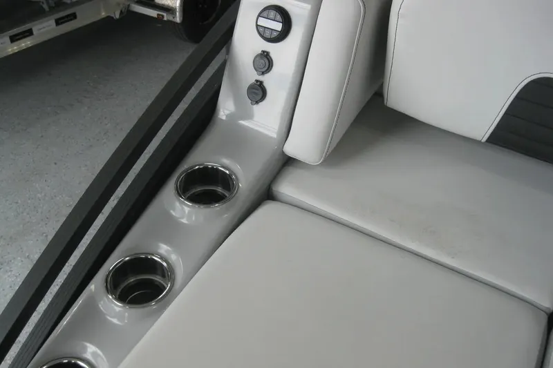 Slide: The Image of 2023 Harris FloteBote 250 Solstice interior with luxurious seating and modern dashboard. - 23