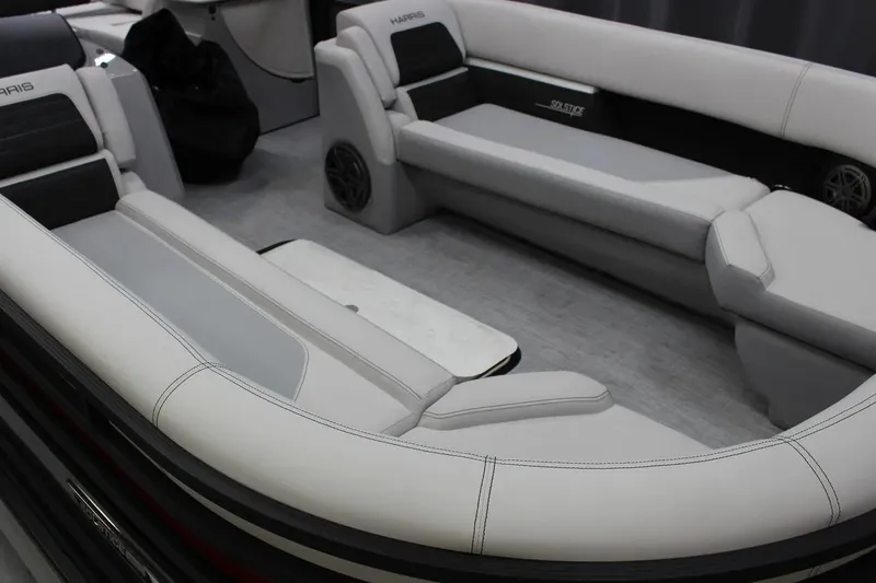 Slide: The Image of 2023 Harris FloteBote 250 Solstice interior with cup holders and seating detail. - 24