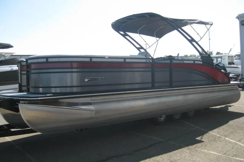 Slide: The Image of 2023 Harris FloteBote 250 Solstice boat interior with speakers and seating. - 9