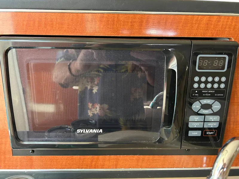 Slide: The Image of Sylvania microwave in 2004 Sea Ray 260 DA boat galley. - 6