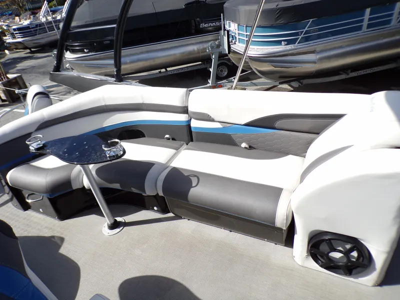 Slide: The Image of 2018 Godfrey Aqua Padio 250 XP pontoon boat interior with seating and table. - 11