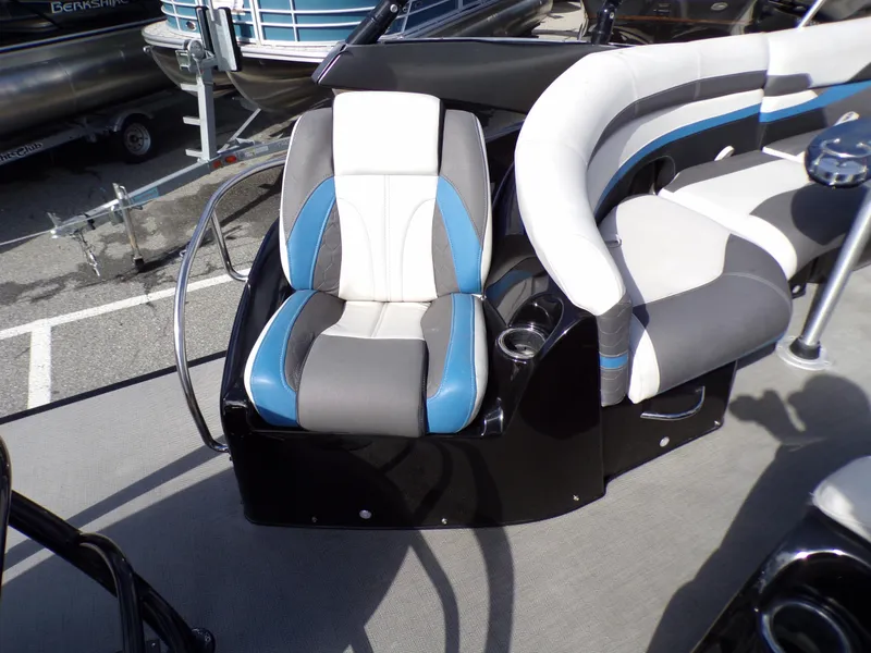 Slide: The Image of Captain's chair and seating area on a 2018 Godfrey Aqua Padio 250 XP pontoon boat. - 14