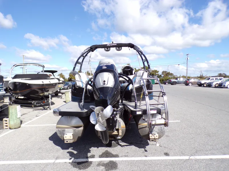 Slide: The Image of 2018 Godfrey Aqua Padio 250 XP pontoon boat in a parking lot. - 4