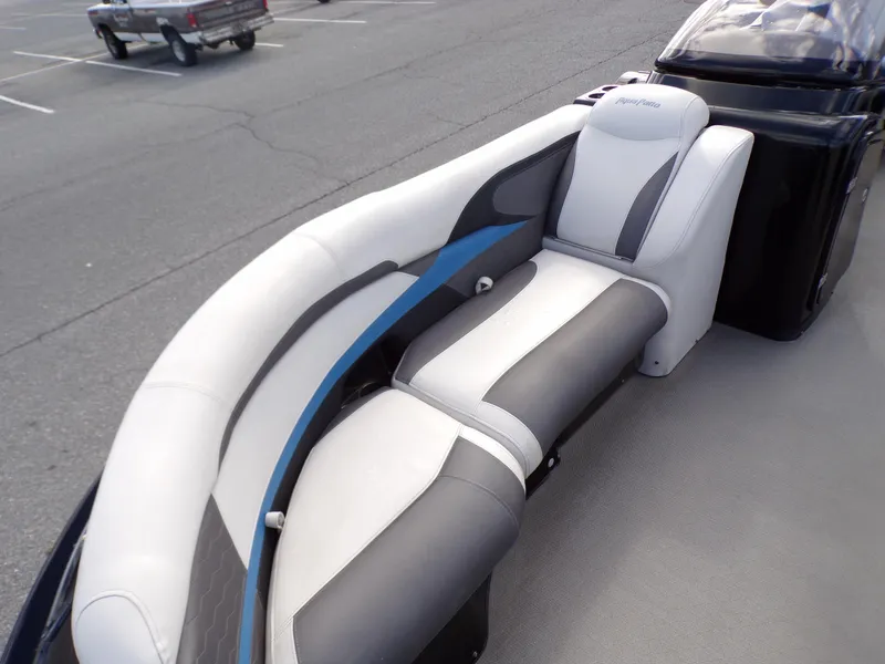 Slide: The Image of 2018 Godfrey Aqua Padio 250 XP boat interior with white and gray seating. - 6