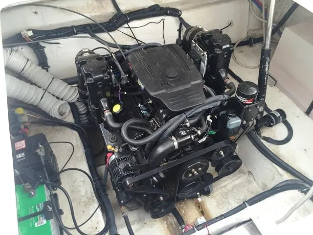 Slide: The Image of 2007 Rinker 270 Express Cruiser engine compartment with visible components. - 20