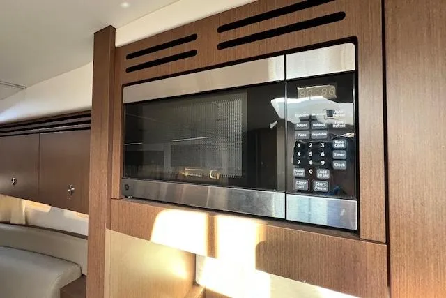 Slide: The Image of Microwave in 2014 Sea Ray Sundancer 350 yacht interior kitchen. - 13