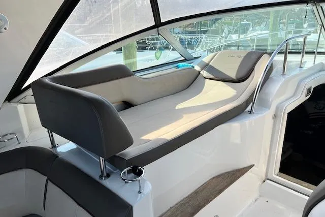 Slide: The Image of 2014 Sea Ray Sundancer 350 interior with sleek seating and modern design. - 29