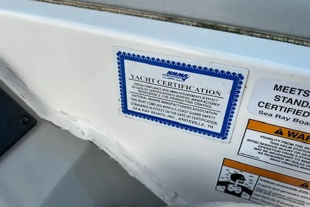 Slide: The Image of 2014 Sea Ray Sundancer 350 yacht certification label on boat interior. - 3