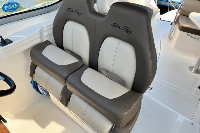 Slide: The Image of 2014 Sea Ray Sundancer 350 boat seats, featuring dual-tone leather upholstery. - 31