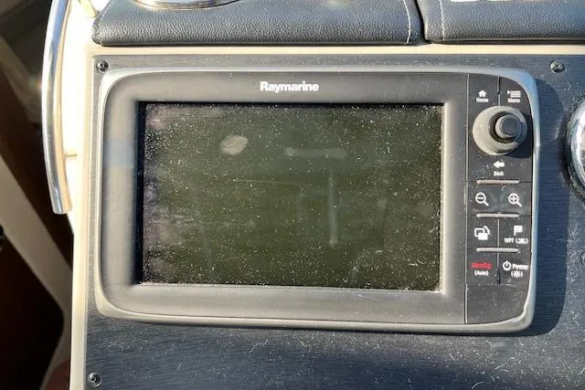 Slide: The Image of Raymarine navigation system on 2014 Sea Ray Sundancer 350 boat dashboard. - 6