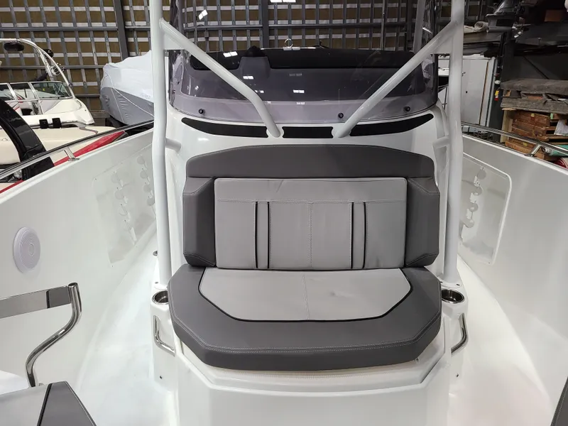 Slide: The Image of 2024 Jeanneau Leader 7.5 WA boat interior with cushioned seating. - 7