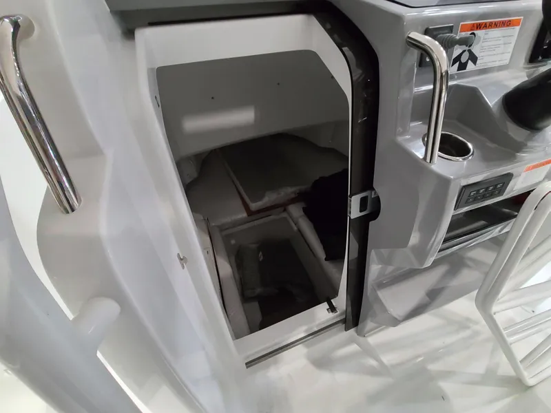 Slide: The Image of 2024 Jeanneau Leader 7.5 WA cabin interior with storage compartments. - 9