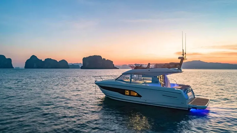 Slide: The Image of 2024 Prestige 420 Fly yacht at sunset on the open sea. - 3