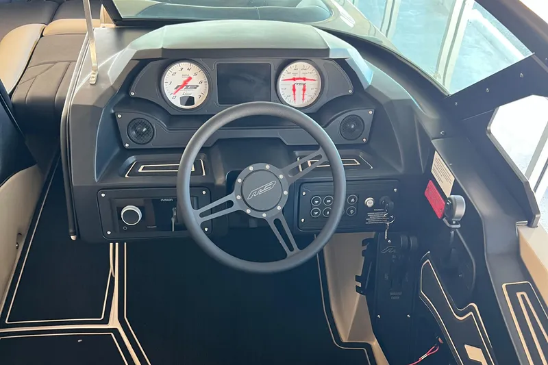 Slide: The Image of 2024 MB F22 Tomcat boat dashboard with steering wheel and gauges. - 10