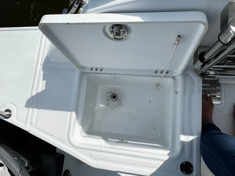 Slide: The Image of Open storage compartment on 2025 Jeanneau Leader 9.0 WA boat deck. - 33