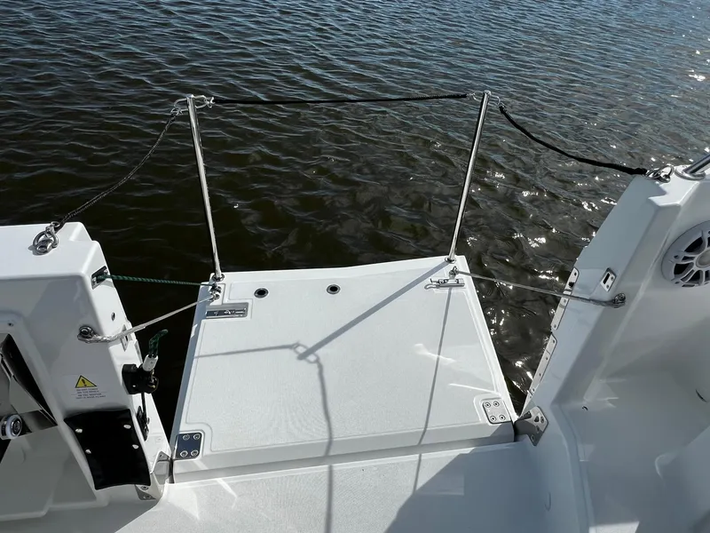 Slide: The Image of 2025 Jeanneau Leader 9.0 WA boat deck overlooking calm water. - 38