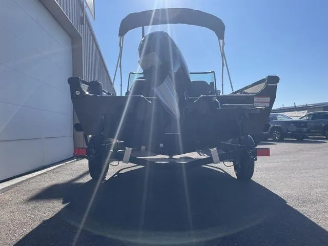 Slide: The Image of 2022 Lowe FS18 boat on trailer, rear view, sunny day. - 4