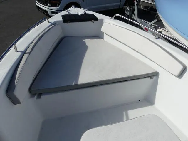 Slide: The Image of Key Largo 1800C 2021 boat console with steering wheel and control panel. - 13