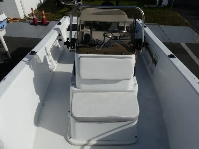 Slide: The Image of 2021 Key Largo 1800C boat interior with white and gray seating. - 14
