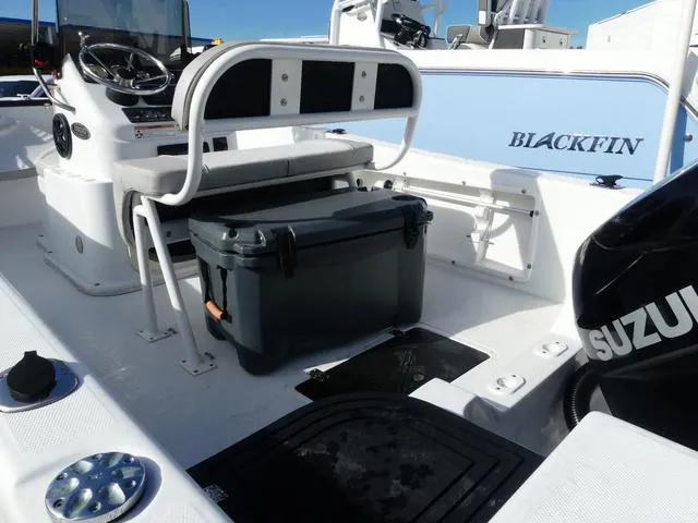 Slide: The Image of 2021 Key Largo 1800C boat on trailer with Suzuki outboard motor. - 8