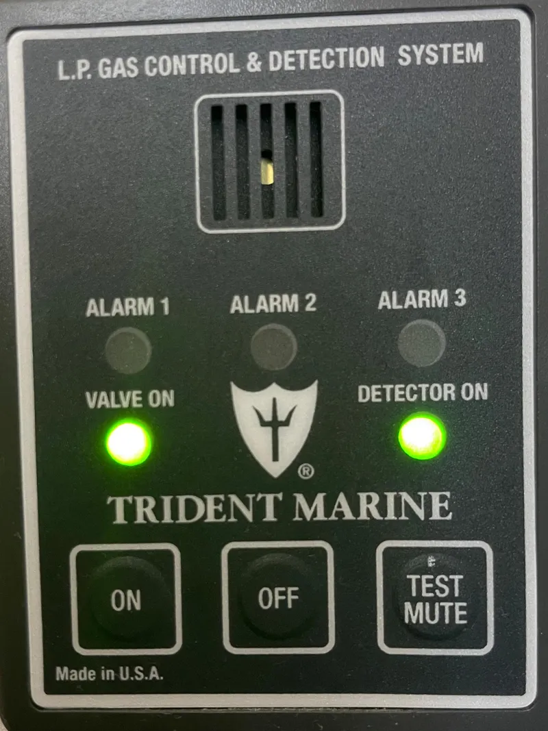 Slide: The Image of Trident Marine LP gas control system with alarms and indicators on a Tollycraft Tollyhome 36. - 39