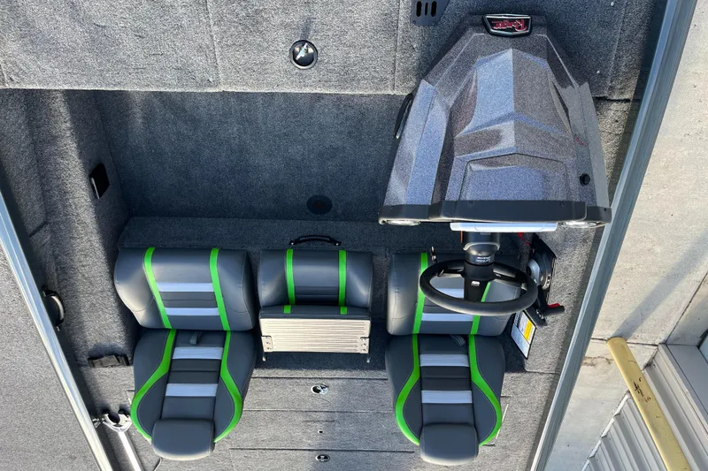 Slide: The Image of 2024 Ranger RT188 boat interior with dual seats and steering console. - 6