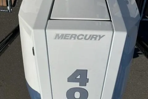 Slide: The Image of 2024 Ranger 2660 Bay boat with Mercury 400 outboard engine. - 10