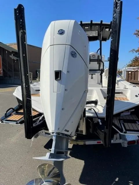 Slide: The Image of 2024 Ranger 2660 Bay boat with powerful outboard motor. - 3