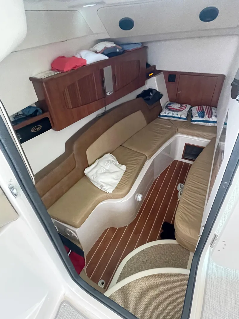Slide: The Image of Interior cabin of 2014 Grady-White Freedom 375 boat with seating and storage. - 4