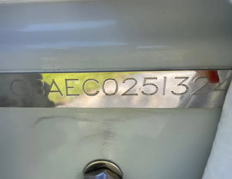Slide: The Image of 2024 Cobia 262 Center Console boat hull with EC025-PBS marking - 11